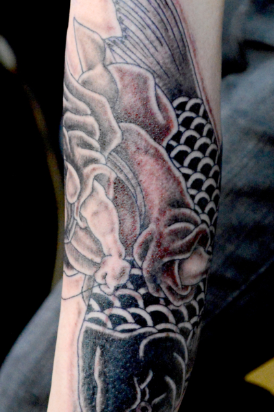 和彫り腕に「七福神 恵比寿」の刺青